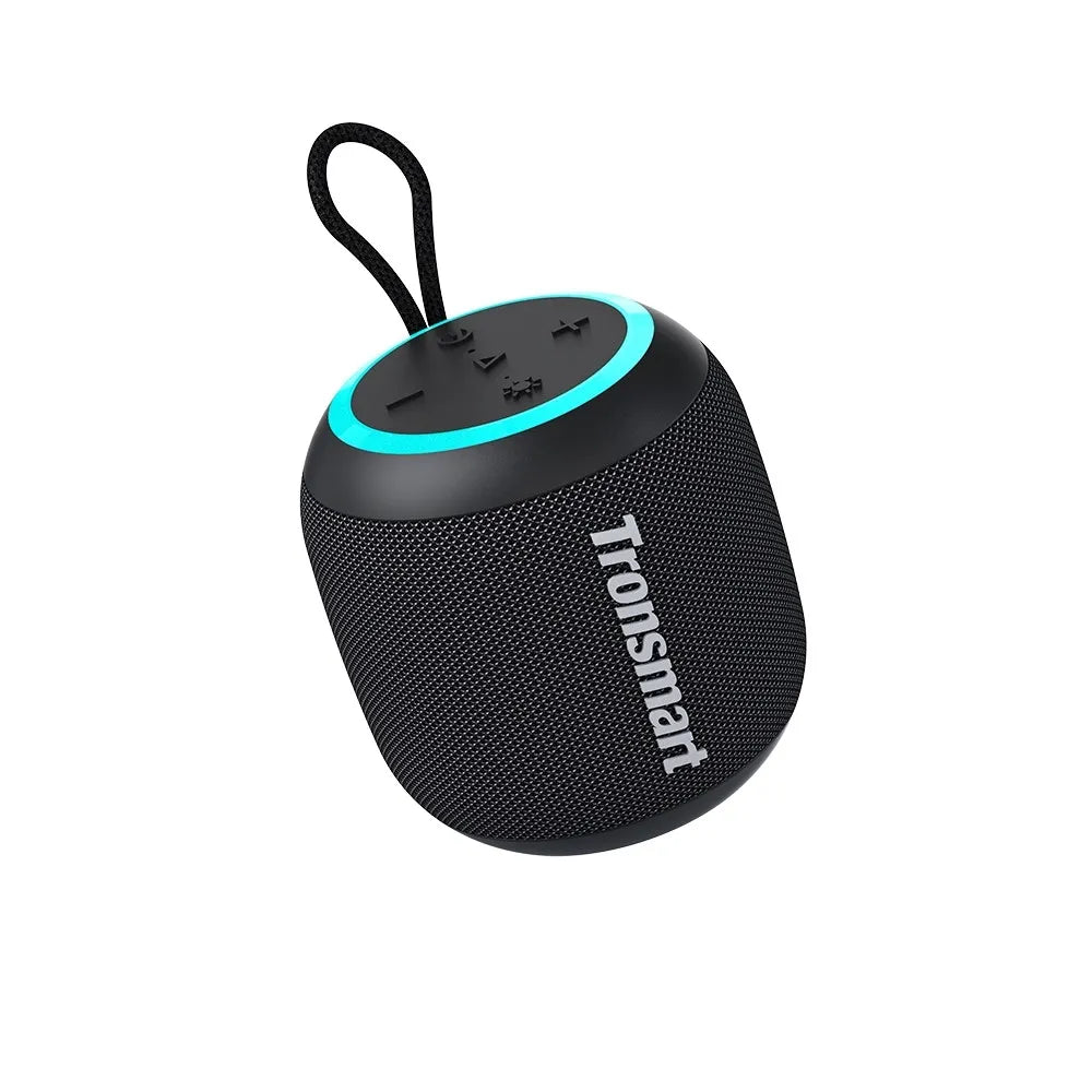 Tronsmart T7 Mini: 15W, IPX7, hasta 18 h (LED off), TWS, luces rítmicas, BT 5.3, MicroSD y Aux-in. Compacto y potente para playa, ducha o viajes.