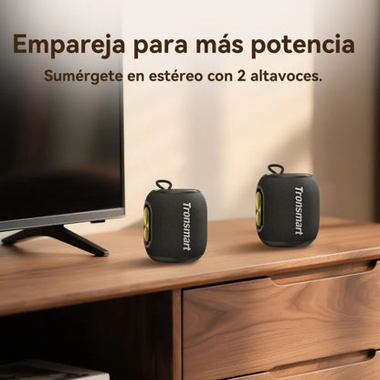 Tronsmart T8 Mini: 16W, IPX7, hasta 20 h (LED off), TWS, sonido 360°, BT 5.3, AUX y TF. Compacto y potente para exteriores y viajes.